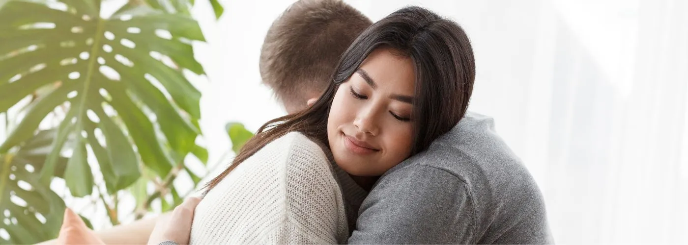 Happy couple strengthening their relationship through therapeutic guidance