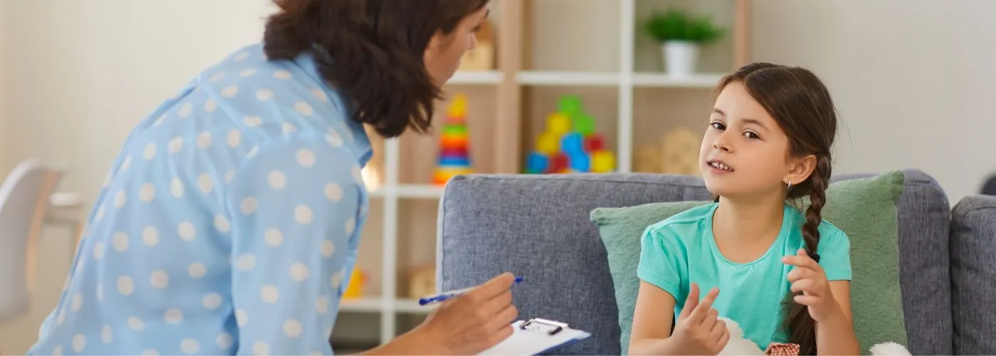 Family with children and teens receiving supportive therapy together
