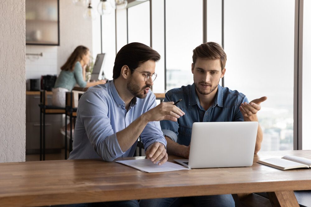 Whole Person Supervision. Two men during a coaching session.