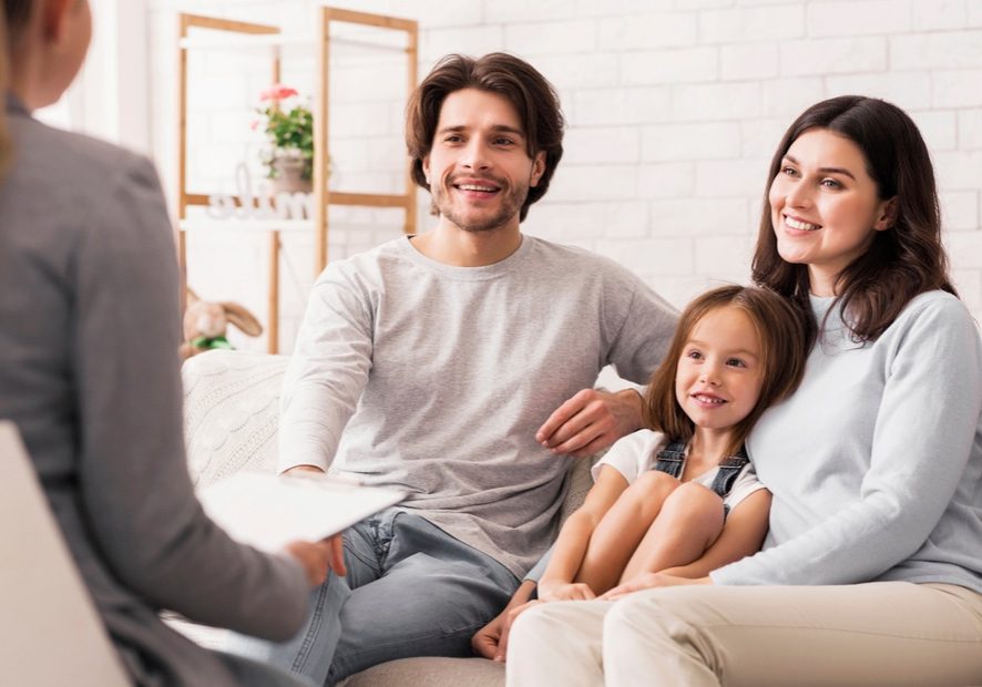 Family Therapy. A family having a therapy session with child.